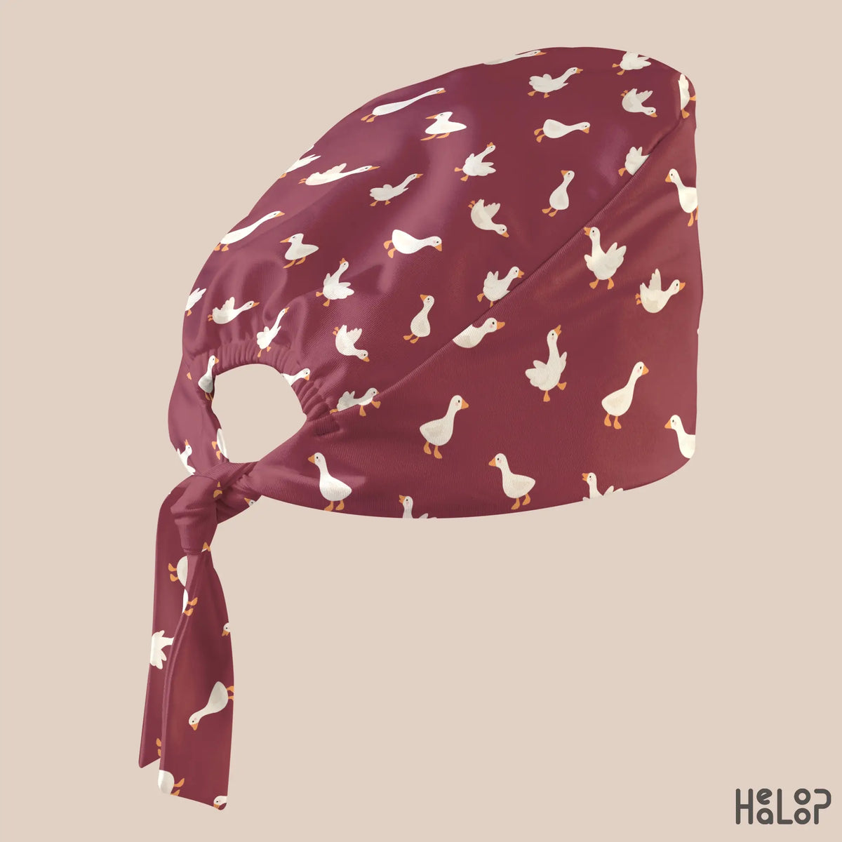 HEALOOP Goose Classic Scrub Cap in an angled side view, highlighting the adorable goose pattern, classic silhouette, and adjustable back ties.
