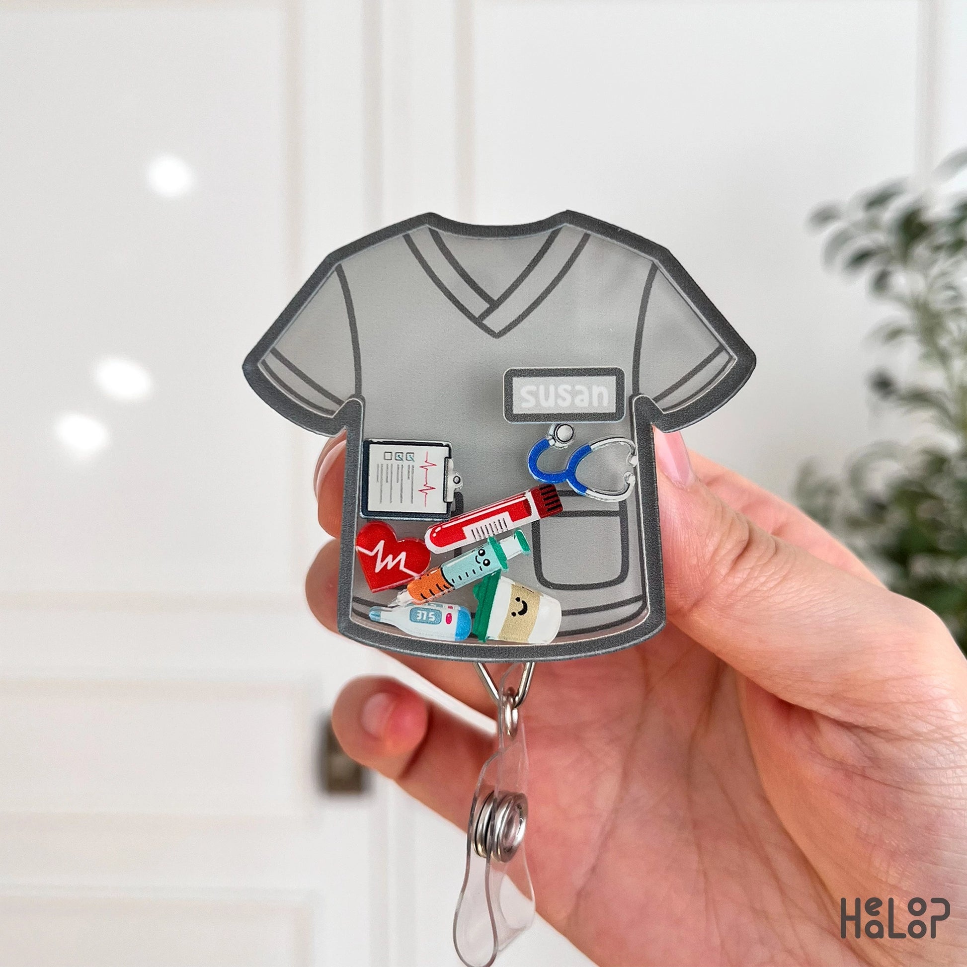 gray nurse scrub badge reel with name susan and medical charms personalized shaker badge reel