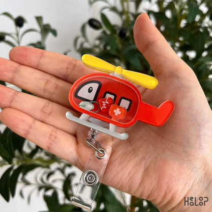 Cute helicopter shaker badge reel for flight nurses, EMTs, paramedics, and EMS professionals with movable medical charms.