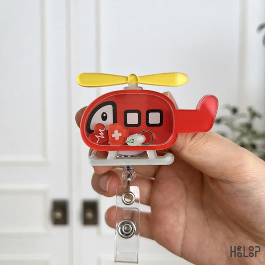 Red rescue helicopter shaker badge reel for flight nurses, EMS professionals, EMTs, and paramedics with cute medical charms.