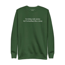 Flat lay of 'I'm feeling really anxious but I'm handling it like a champ' sweatshirt in Forest Green with premium embroidered text.