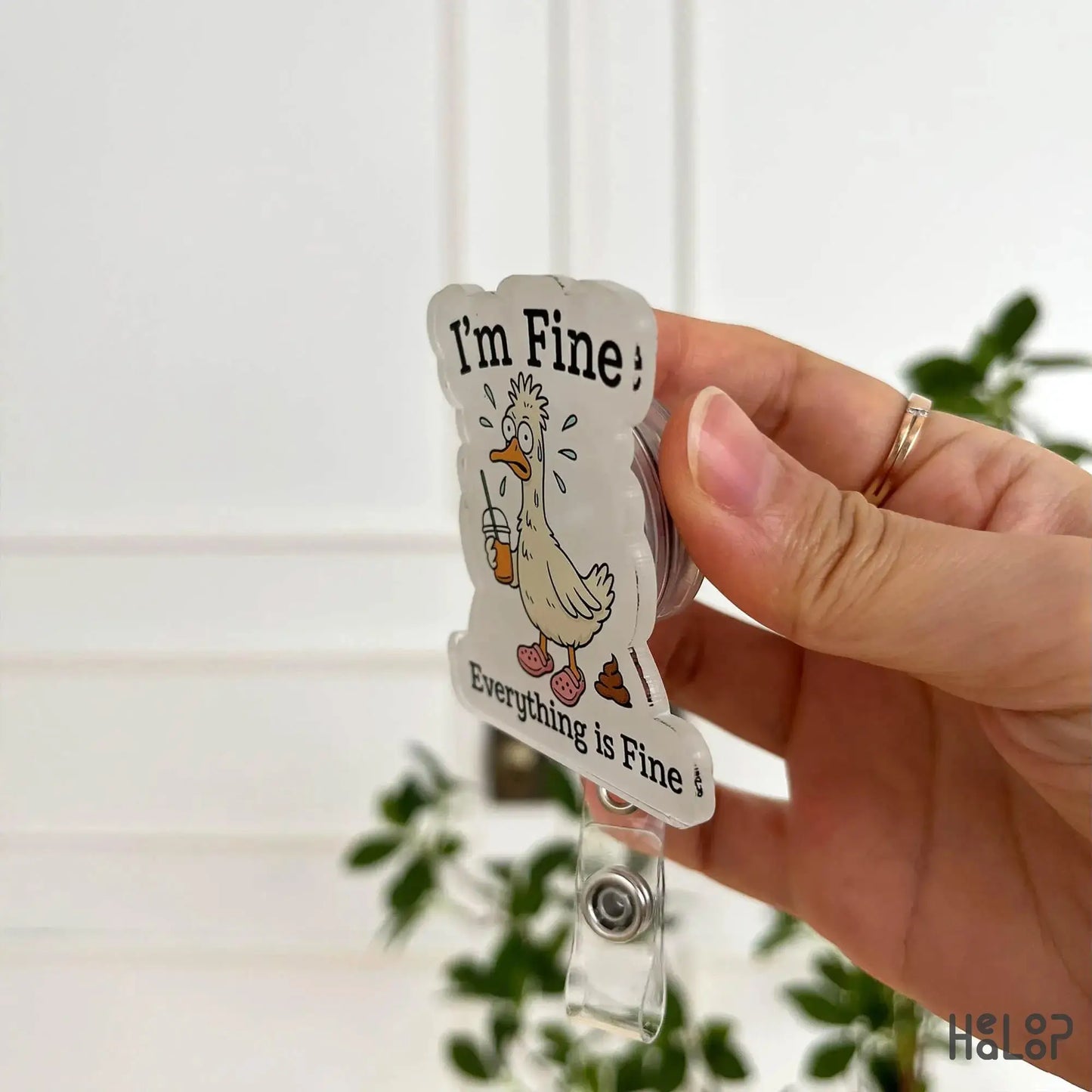 Side view of Healoop I’m Fine Everything is Fine Badge Reel – cute and durable retractable nurse badge holder