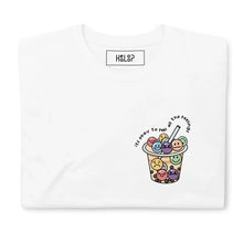 White folded T-shirt featuring the phrase 'It's okay to feel all the feelings' and a Boba Tea illustration with expressive tapioca pearls.