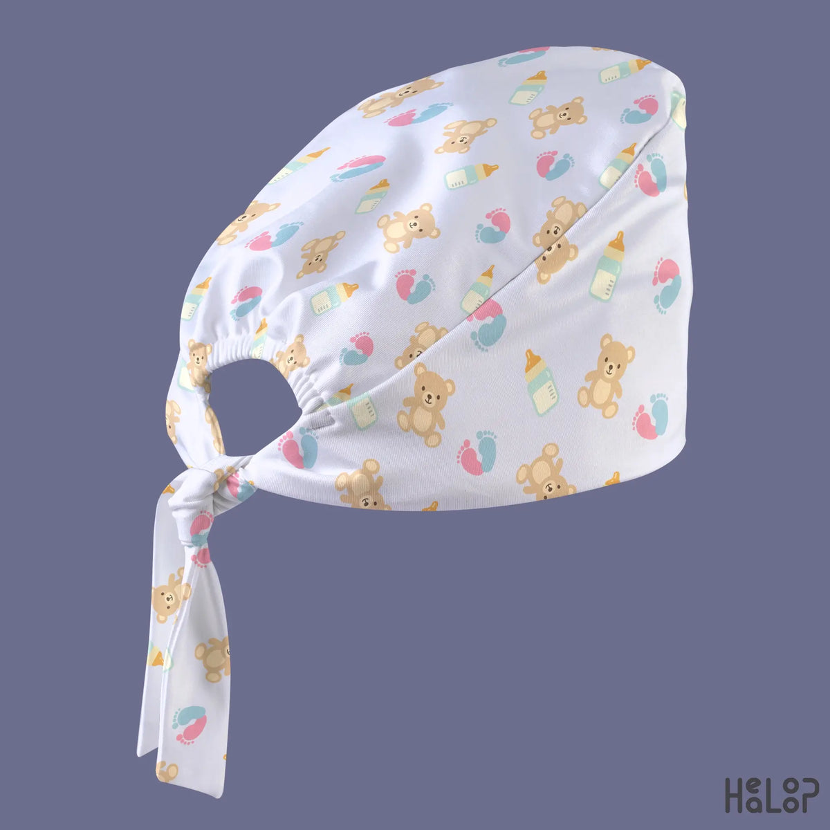 L&D NICU classic scrub cap angled view highlighting cute teddy bears, mint green baby bottles, pink and blue footprints, and adjustable fabric ties. Copy