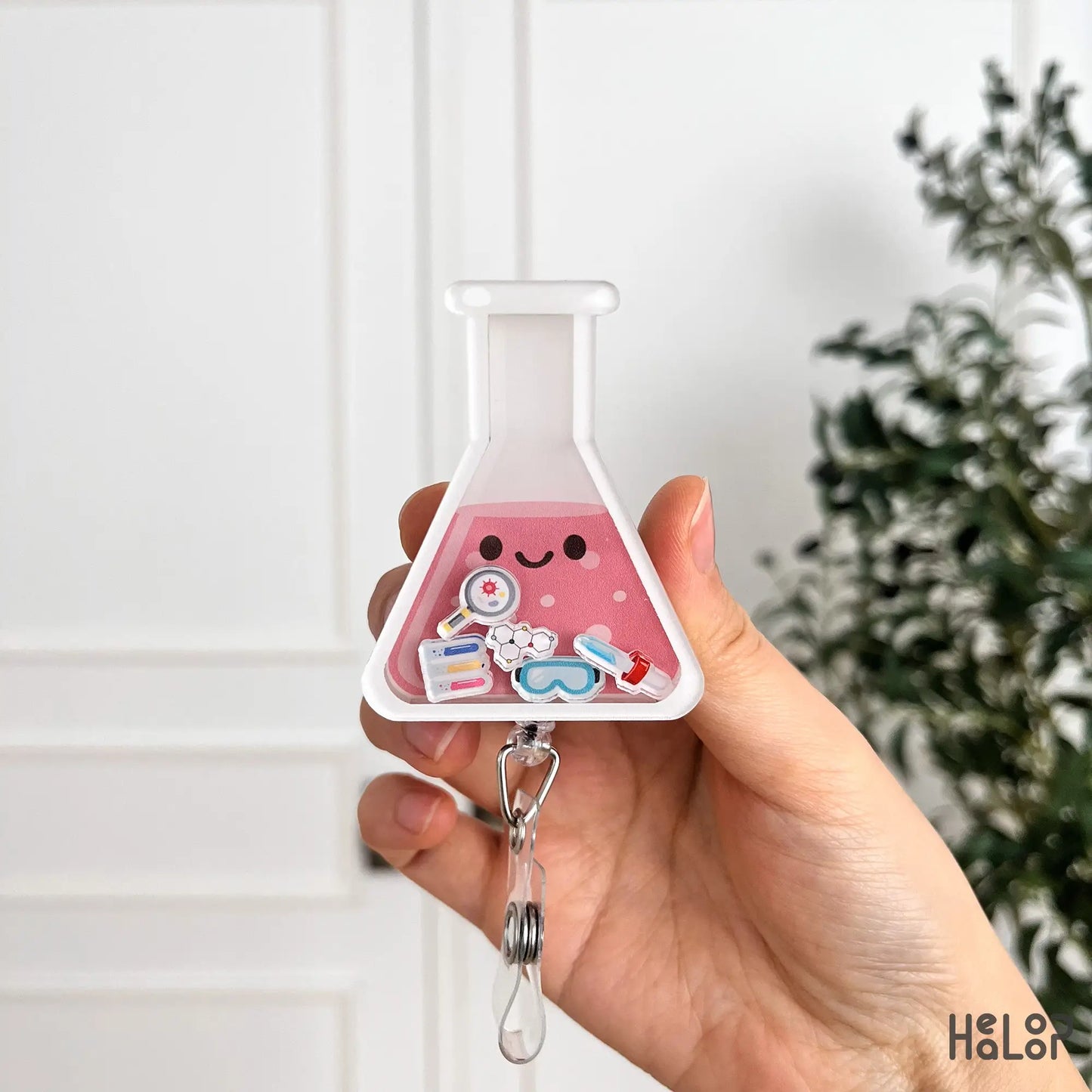 Beaker shaped lab shaker badge reel with science themed charms