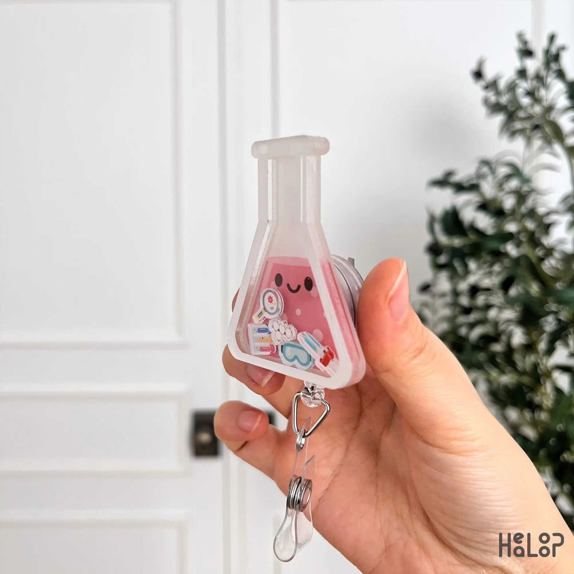 Lab shaker badge reel side view showing beaker shaped acrylic design