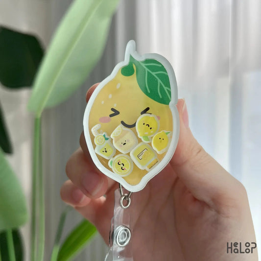 Handheld Healoop lemon badge reel with kawaii lemon charms, ideal nurse gift and fun ID clip