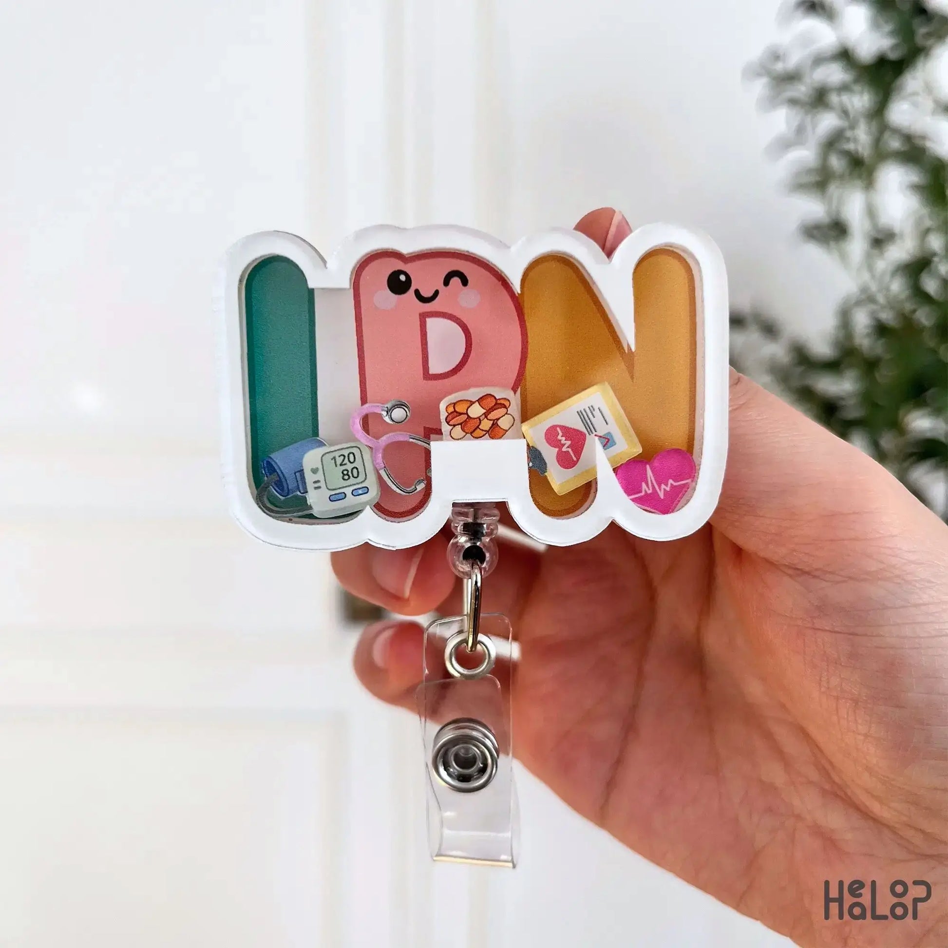 Licensed practical nurse shaker badge reel with blood pressure monitor stethoscope and heart charms