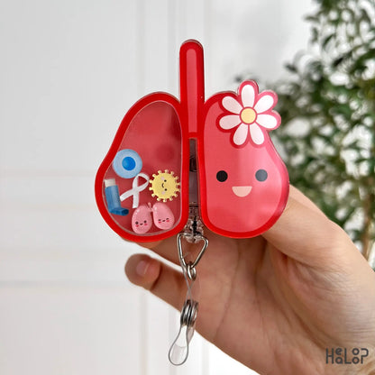 Lung Shaker Badge Reel – red lung design with flower accent and mini medical charms inside