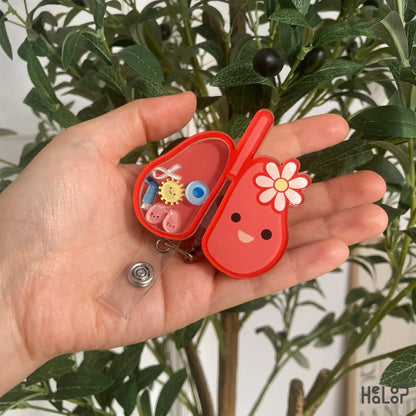 Cute lung badge reel held in hand — perfect for respiratory therapists and nurses