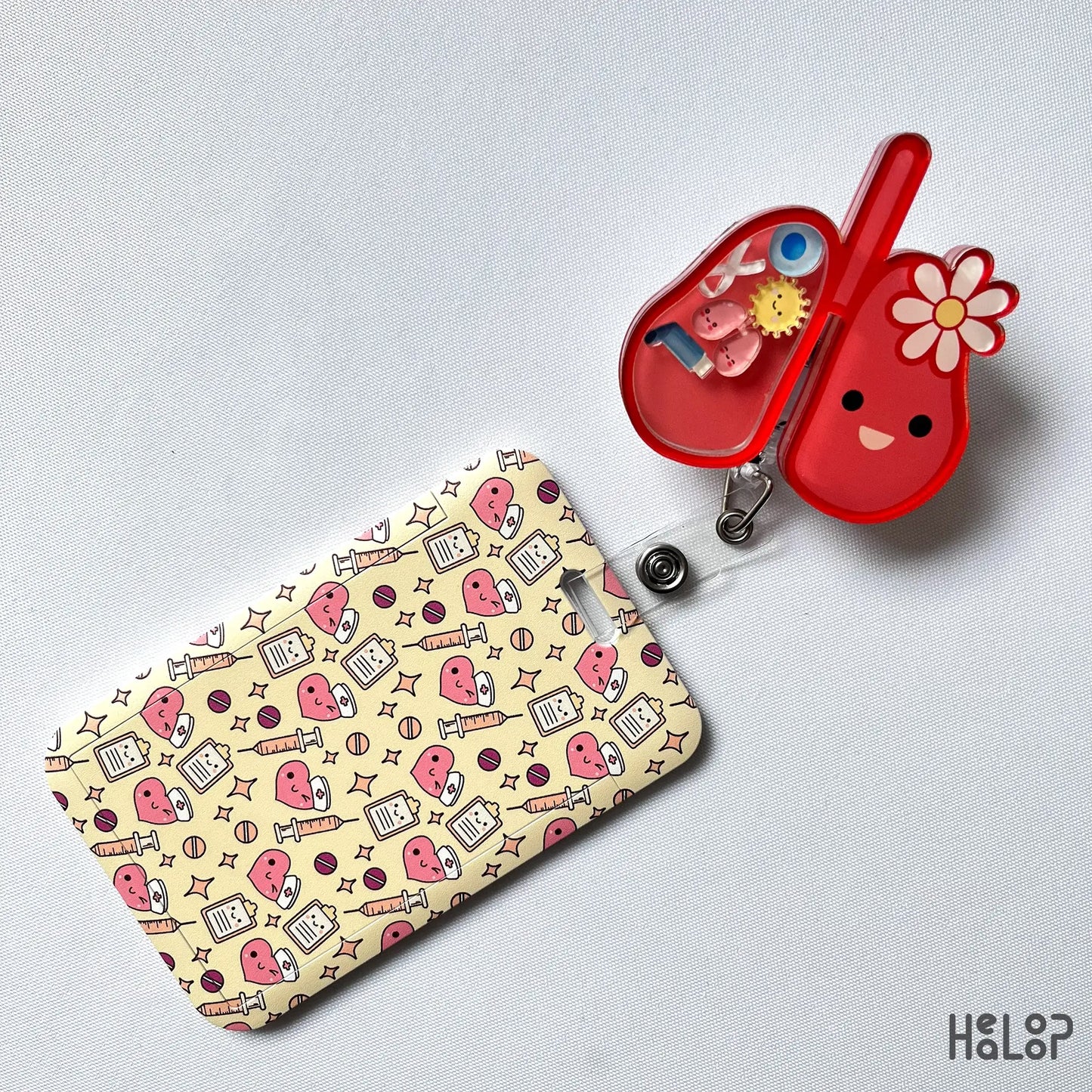 Lung shaker badge reel displayed with matching medical ID badge holder