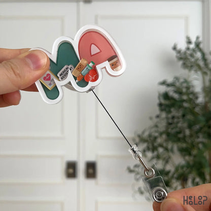 MA badge reel with retractable cord extended for easy ID access