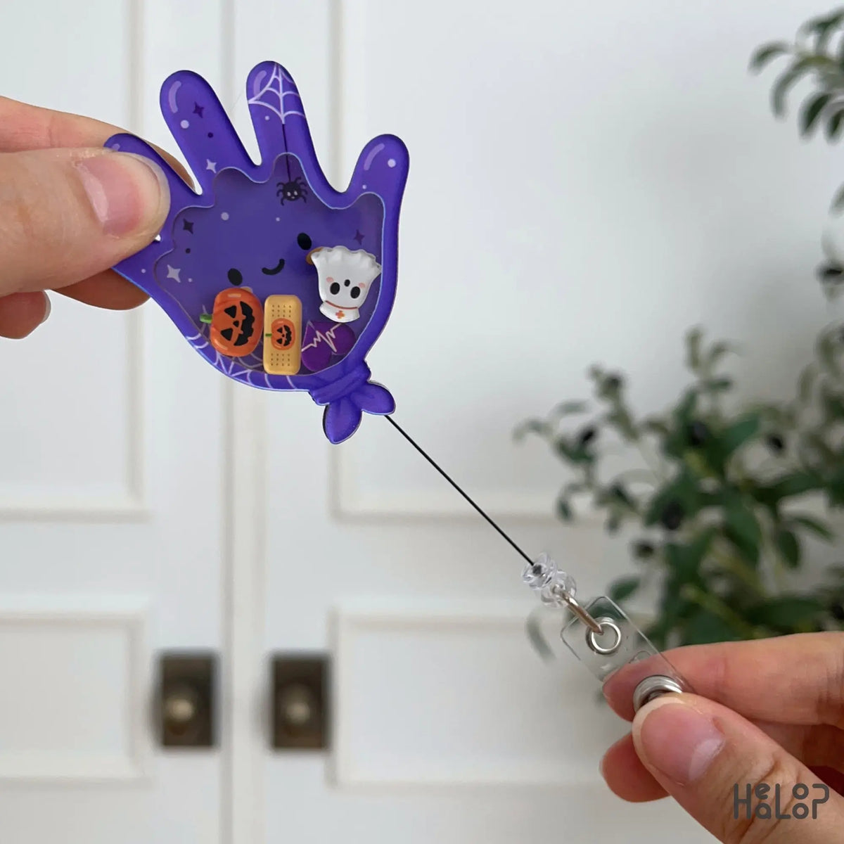 Medical Glove Shaker Badge Reel Halloween Version Side with extended retractable cord and cute medical charms.