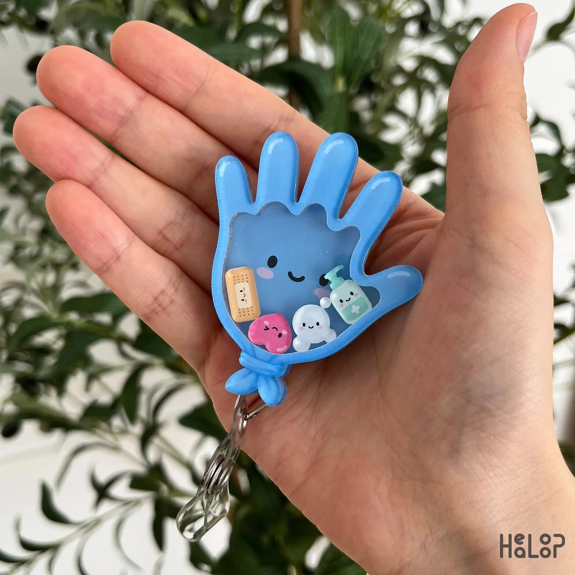 Medical Glove Shaker Badge Reel with cute moving healthcare charms, a fun ID holder for nurses and medical workers.