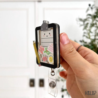 Acrylic side profile of Mental Health Board shaker badge reel