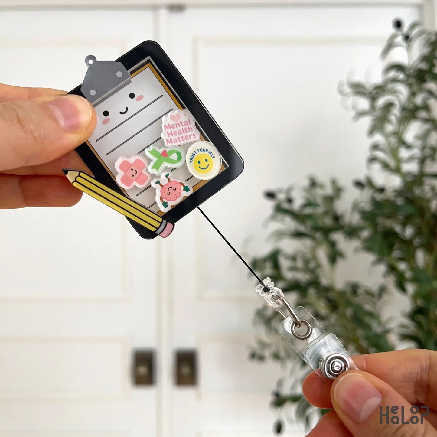 Retractable Mental Health Board badge reel extended