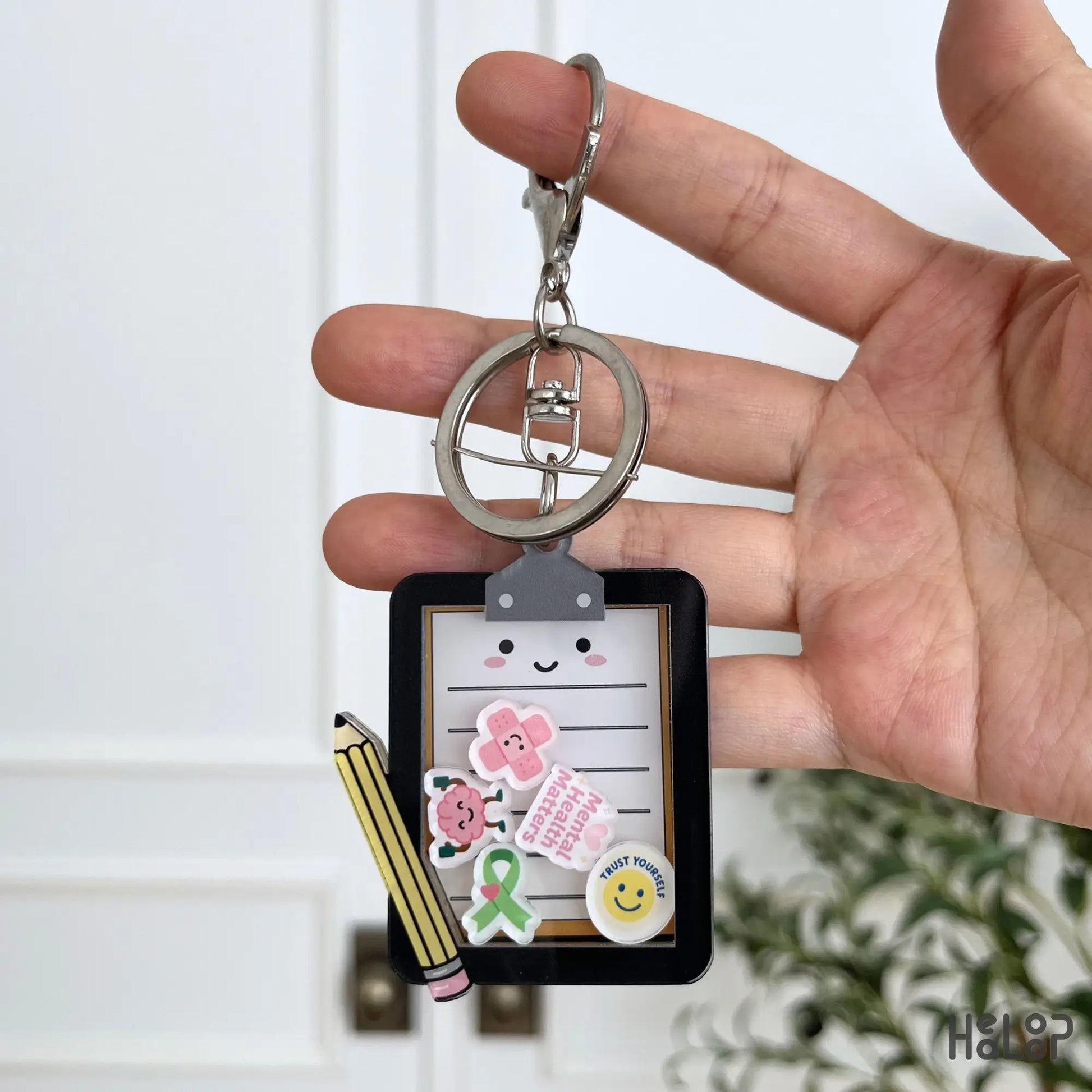 Mental Health Board Shaker Keychain with colorful moving charms for therapists, counselors, and social workers.