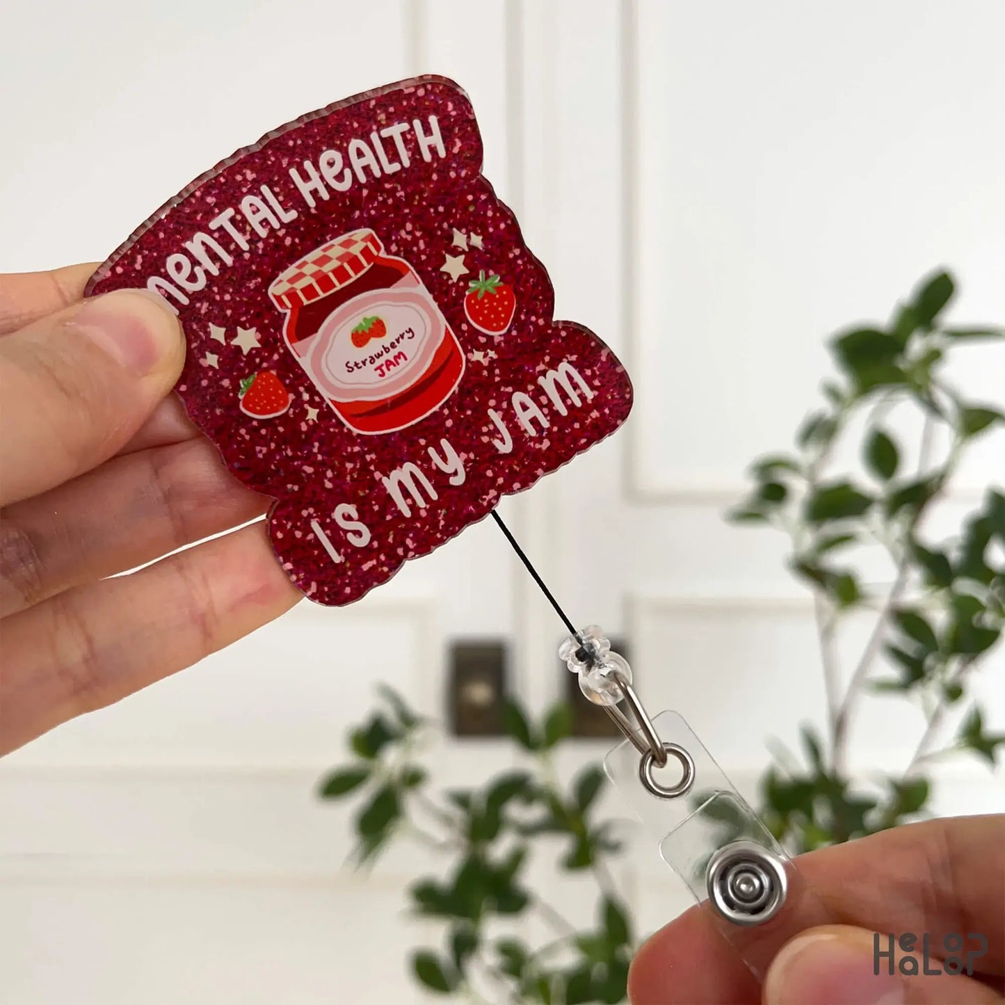 Cute retractable acrylic badge reel with printed sparkle design and mental health message