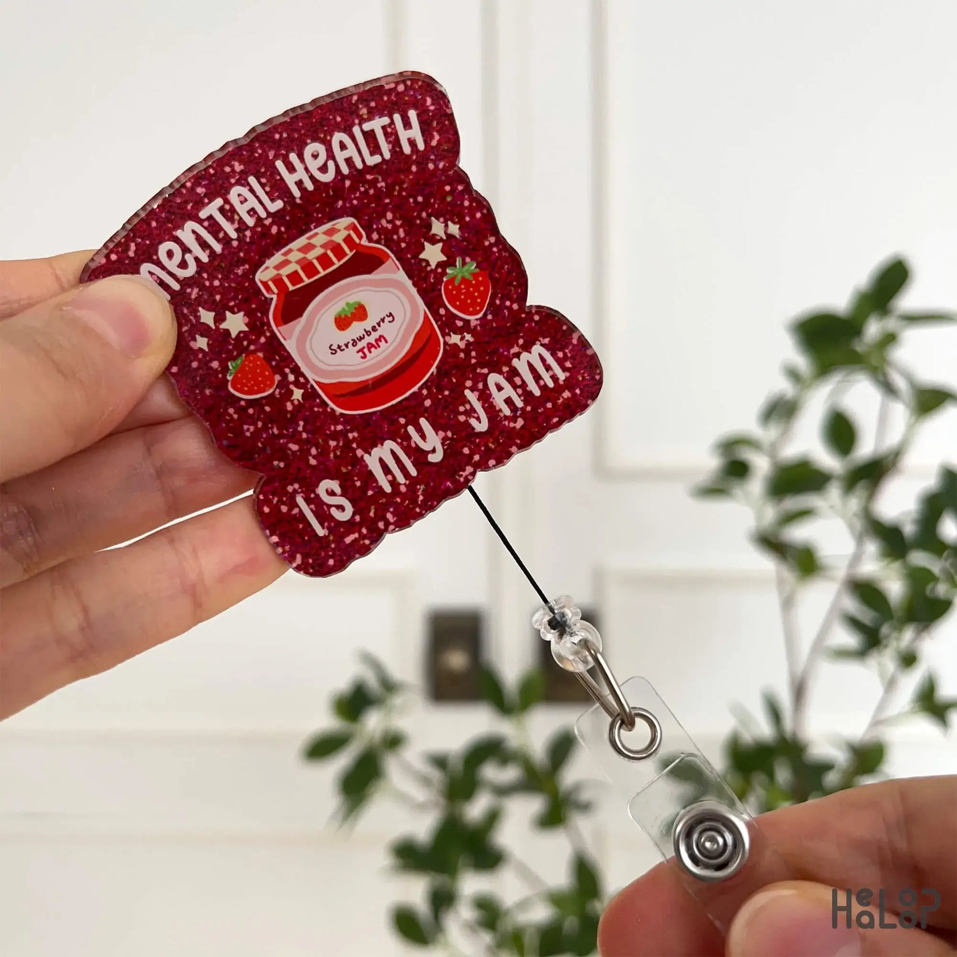 Cute retractable acrylic badge reel with printed sparkle design and mental health message