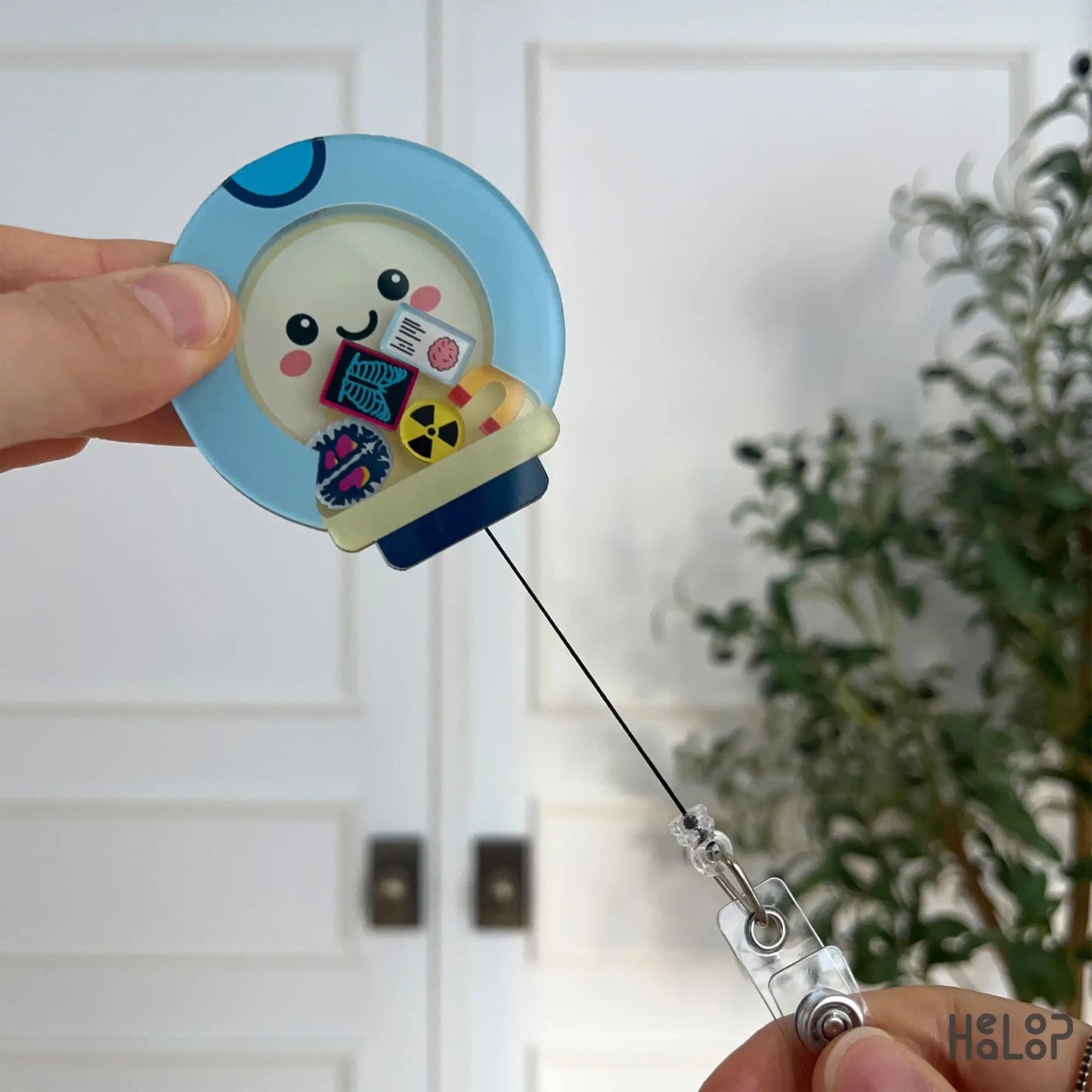 mri shaker badge reel with cord pulled out