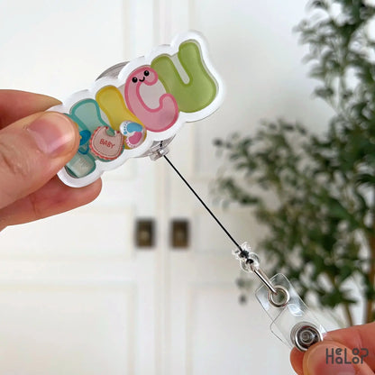 Retractable neonatal nurse badge reel baby themed design