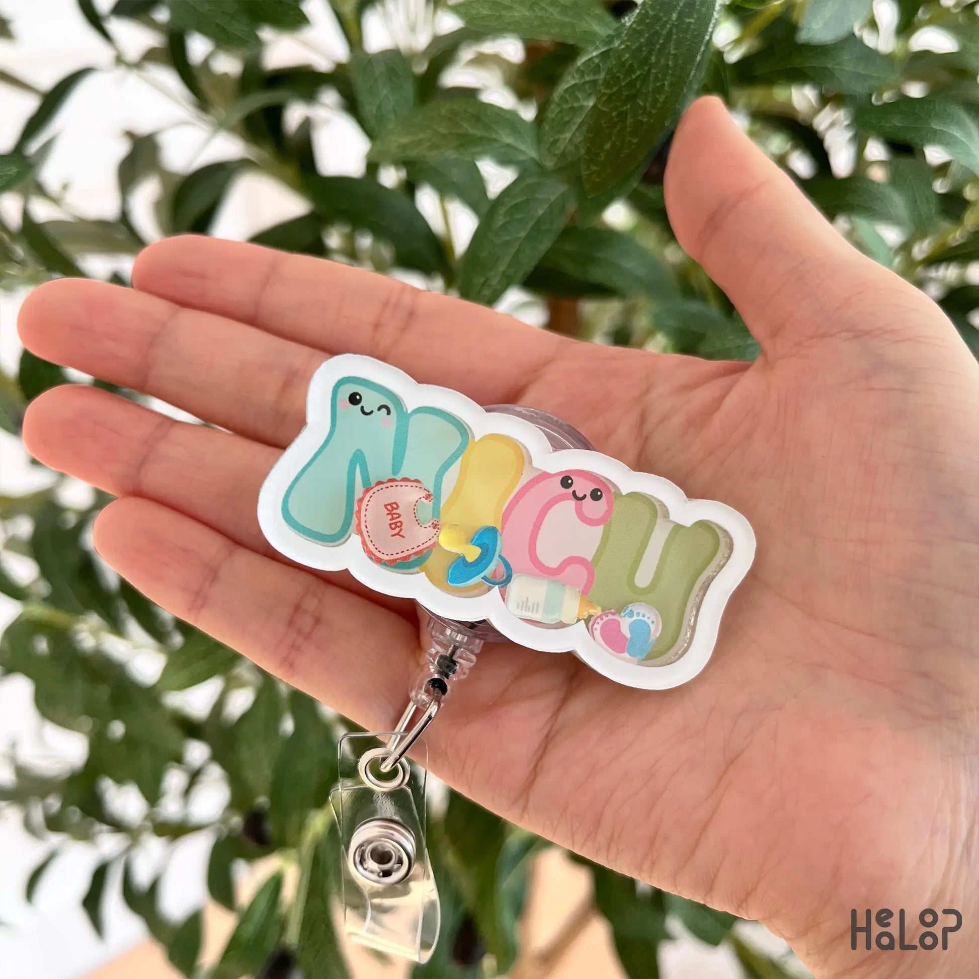 Cute NICU nurse shaker badge reel with baby icons