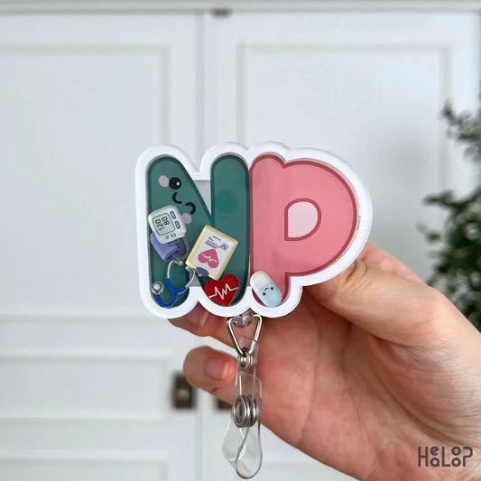 NP Shaker Badge Reel with cute medical shaker charms for Nurse Practitioners, healthcare workers, and NP students.