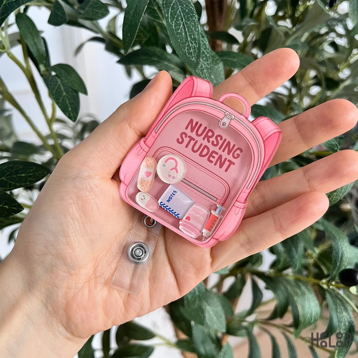 Nursing Student shaker badge reel with pink backpack and school nurse-themed charms