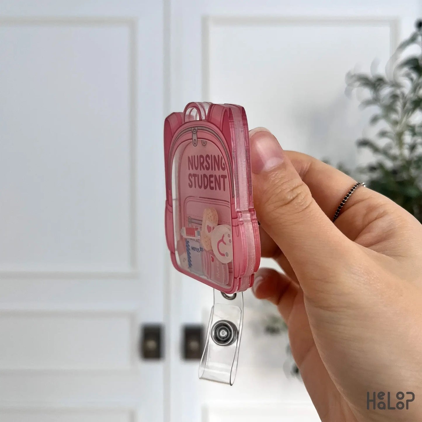 Acrylic layered side view of Nursing Student shaker badge reel