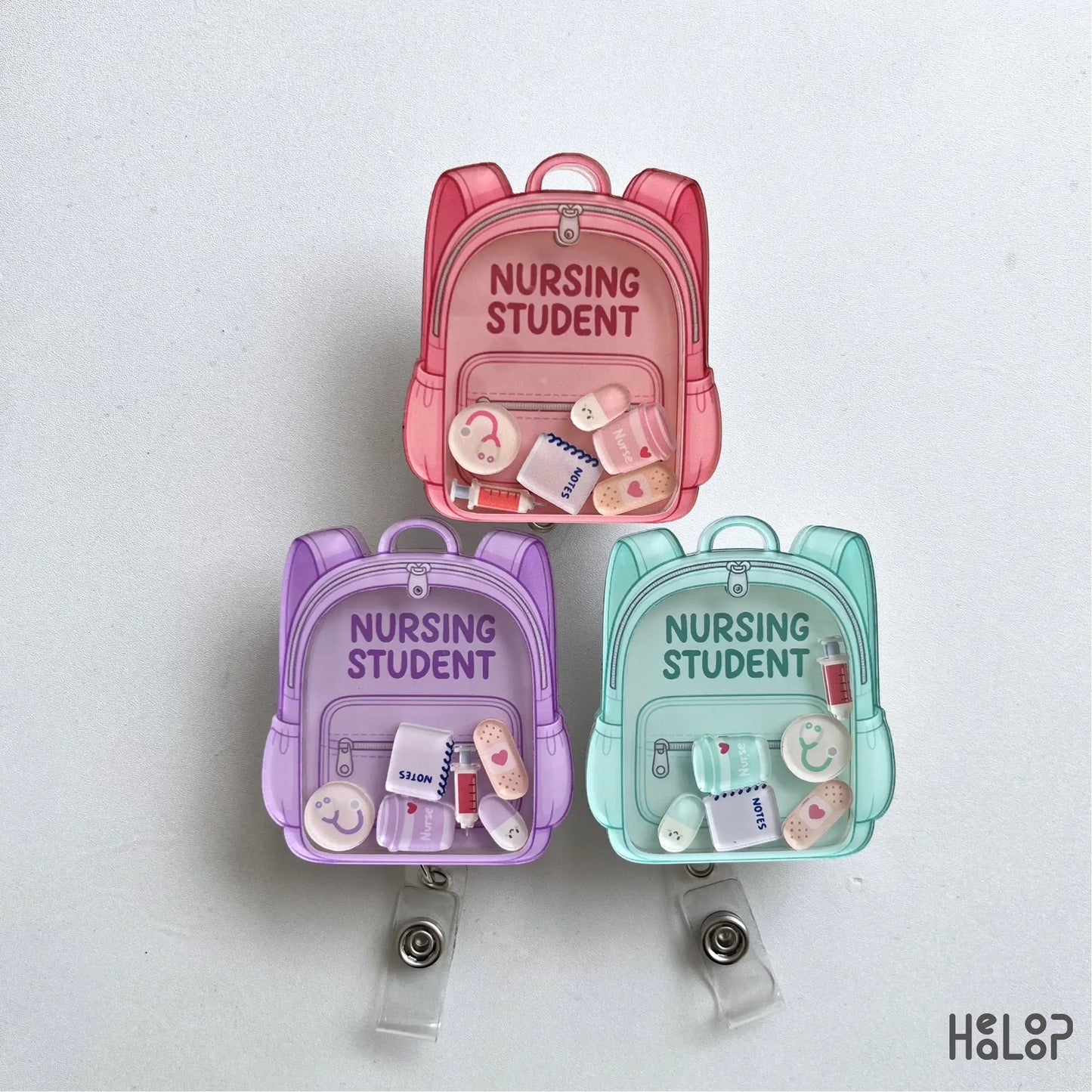 Cute Nursing Student Shaker Badge Reels in three color options with medical themed shaker charms