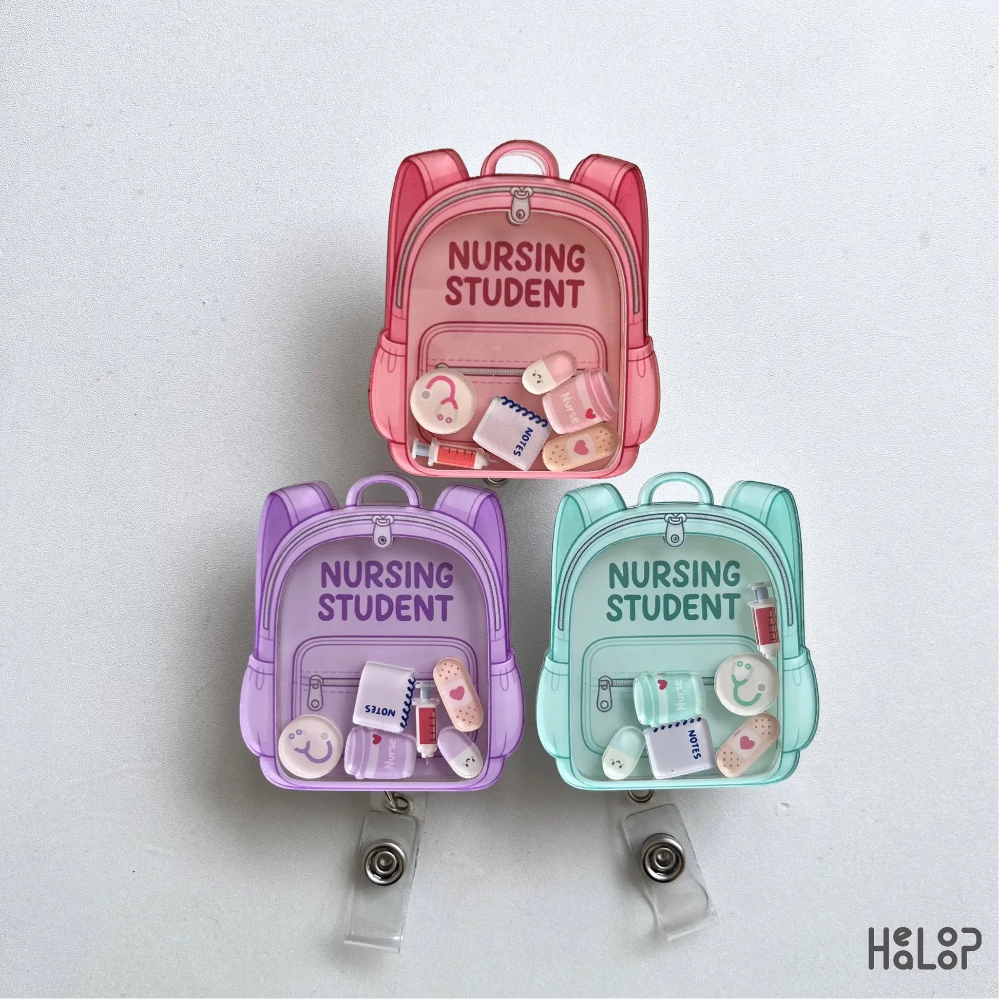 Cute Nursing Student Shaker Badge Reels in three color options with medical themed shaker charms