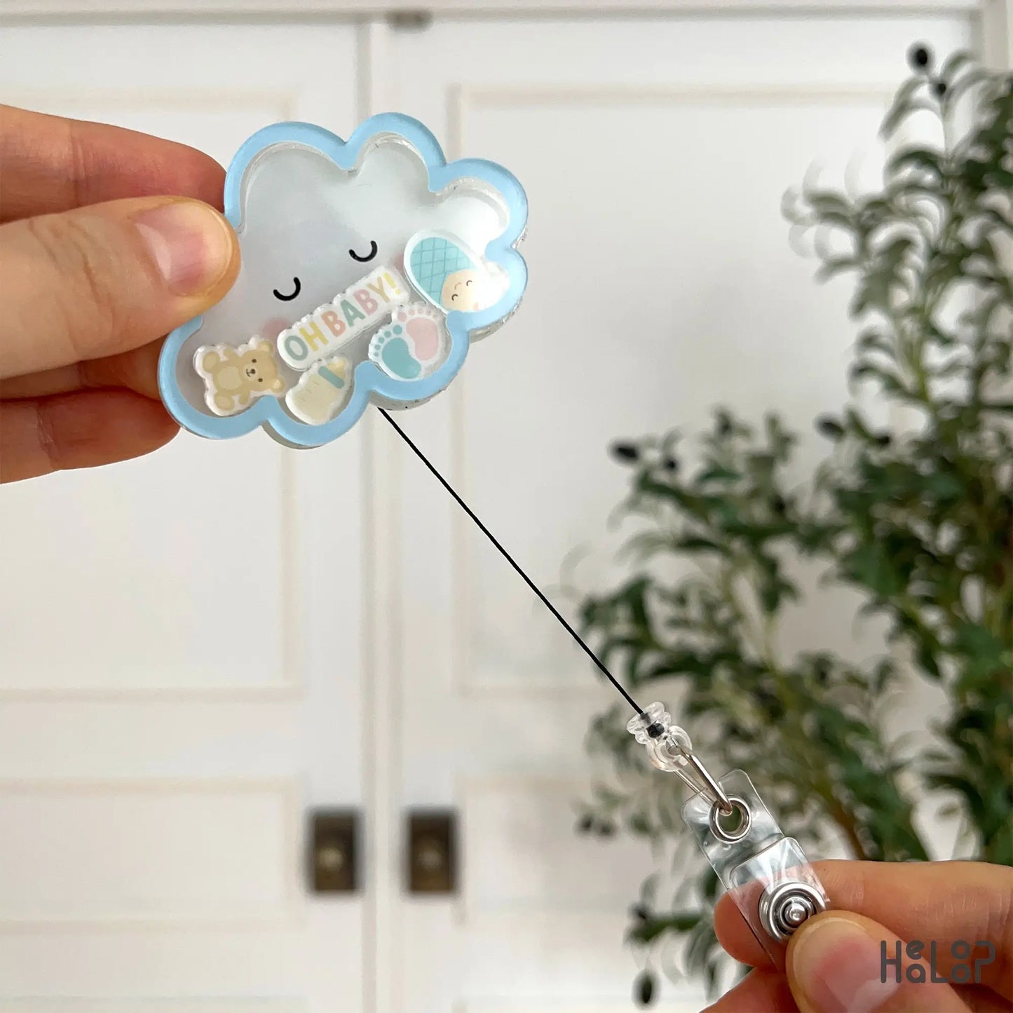Oh Baby cloud ID badge reel showing extended pull cord for work ID access.
