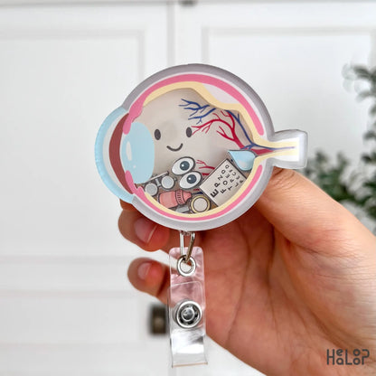 Eye-anatomy themed ophthalmology shaker badge reel featuring cute design for healthcare workers.