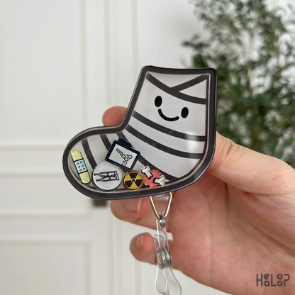 Front view of orthopedic shaker badge reel for nurses, doctors, and healthcare staff