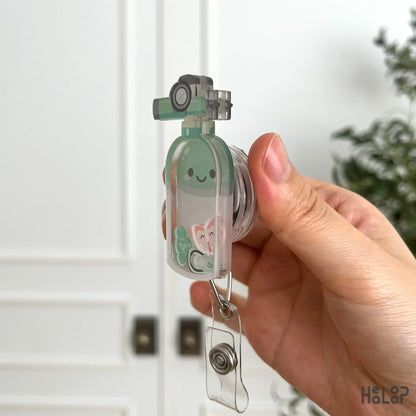 Profile view of oxygen tank shaker badge reel acrylic medical accessory