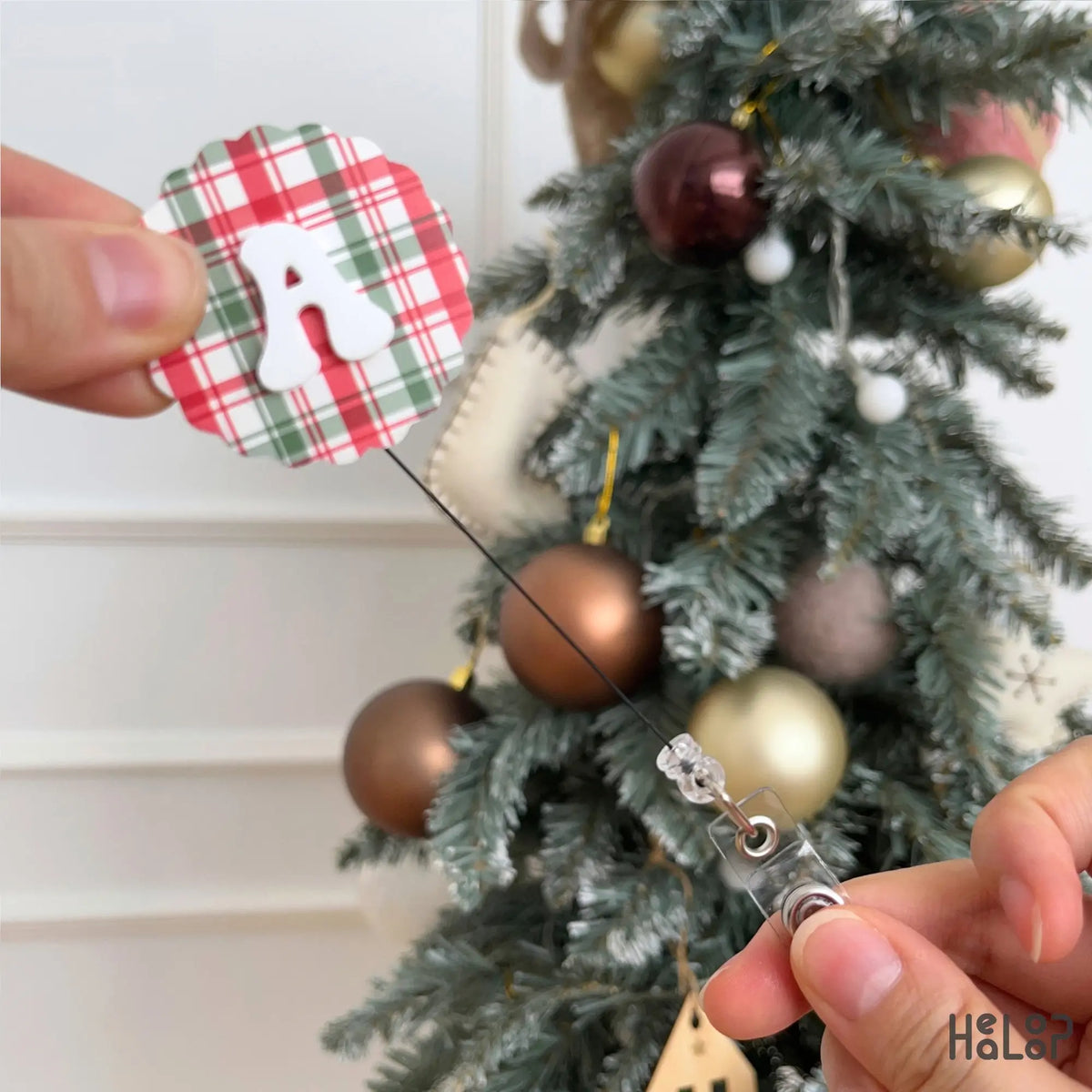 Personalized Christmas plaid badge reel with raised white initial A and retractable ID holder