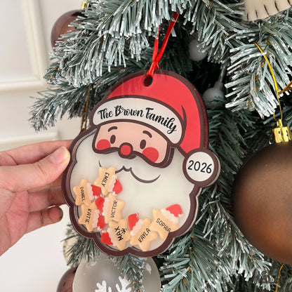 Personalized Santa shaker Christmas ornament featuring a custom family name, year, and individual family member name charms.