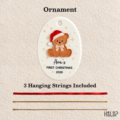 Personalized First Christmas teddy bear ornament with red ribbon, gold string and jute twine