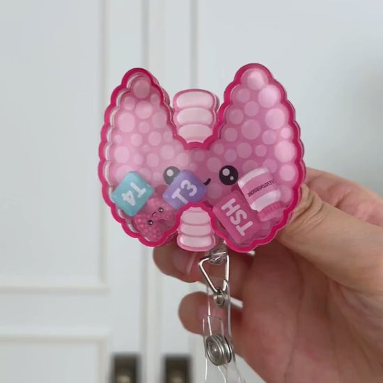 Thyroid shaker badge reel video