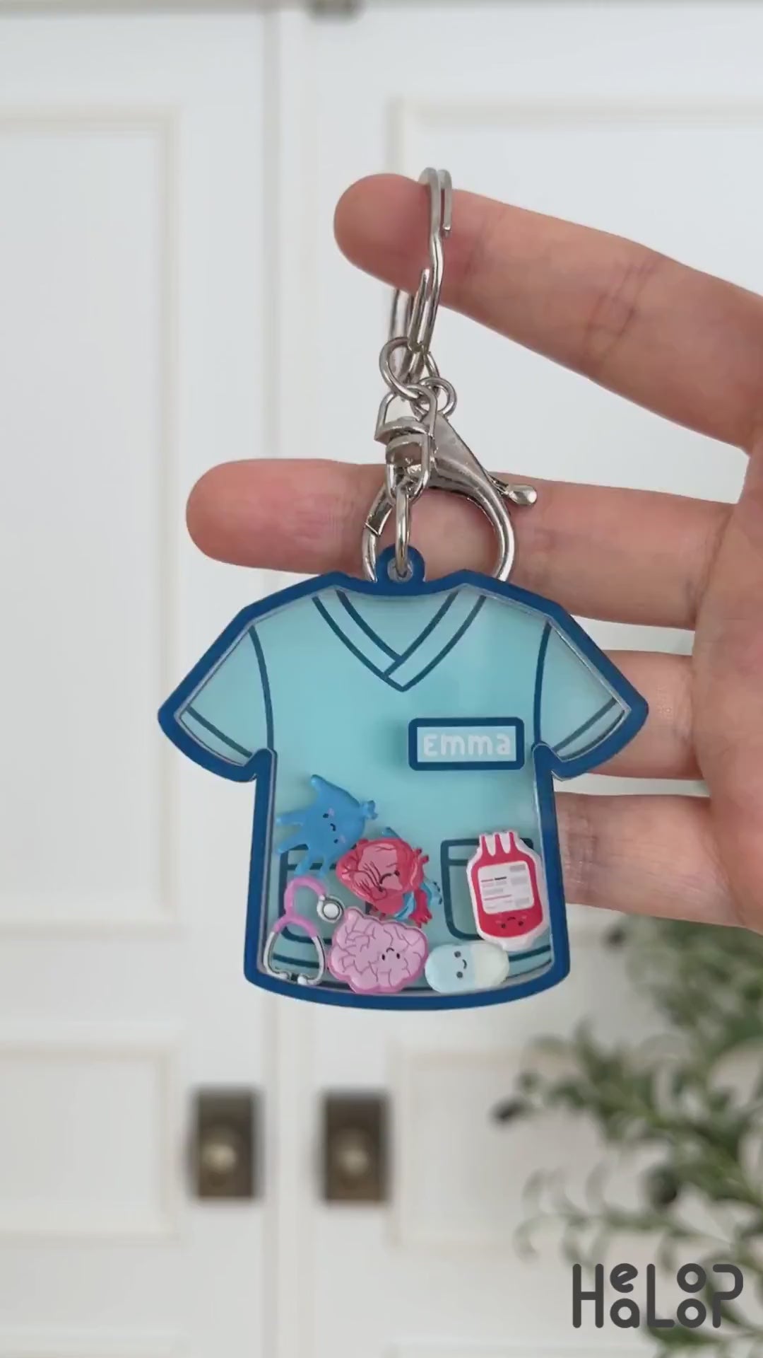 Custom nurse scrub top shaker badge reel video