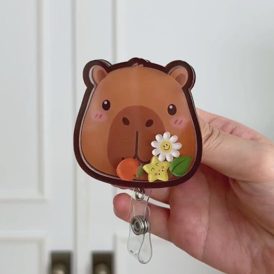 Capybara shaker badge reel video