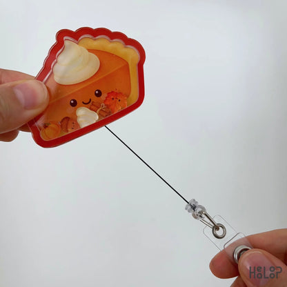 Pumpkin Pie Shaker Badge Reel with retractable cord demonstrating smooth extension, ideal for fall-themed nurse badge holders and healthcare accessories.