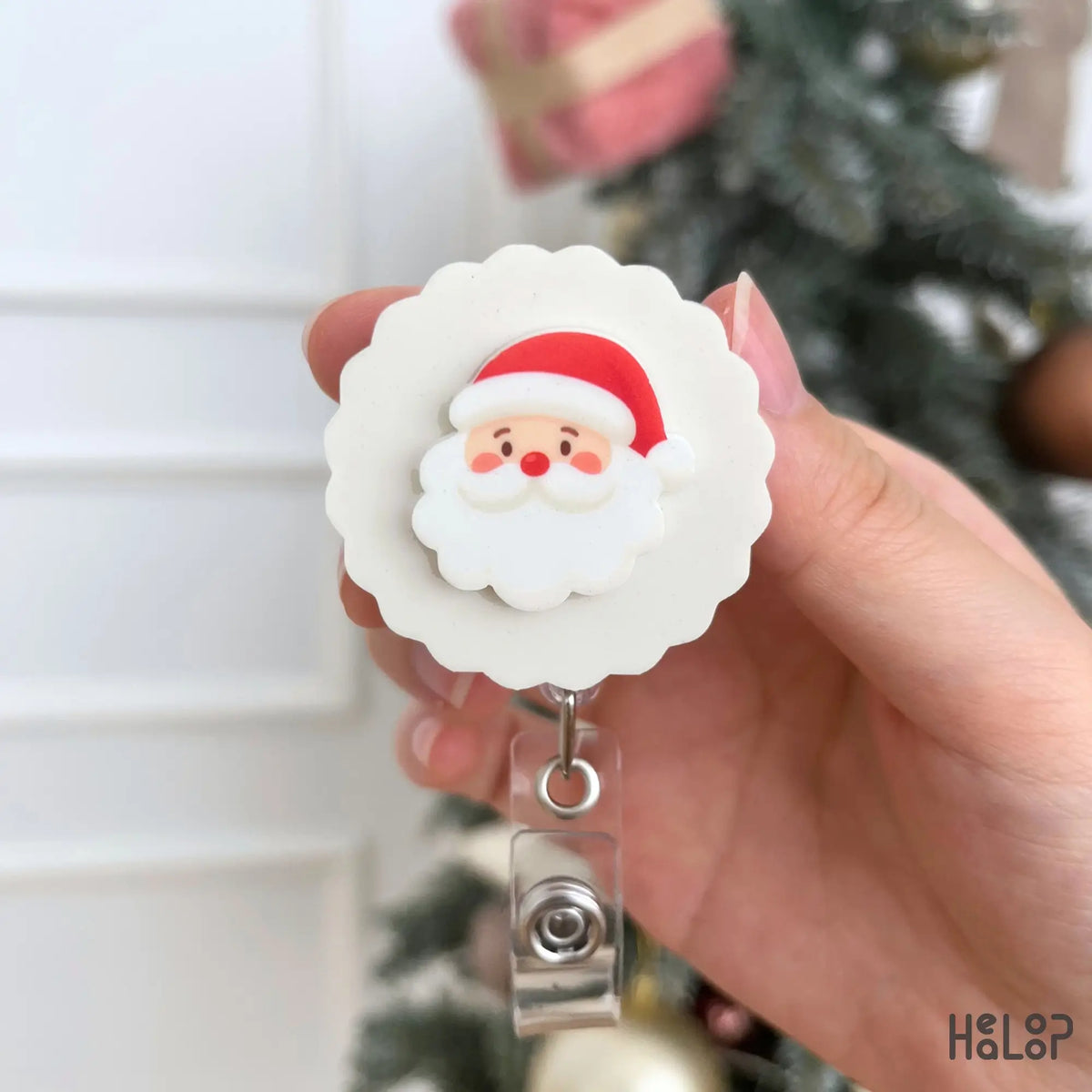 Cute Santa retractable Christmas badge reel on white scalloped background