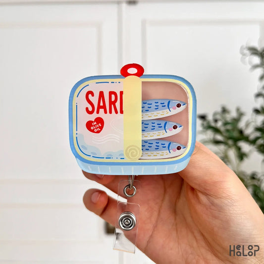 Cute sardine shaker badge reel with fish charms inside the tin, fun retractable ID badge clip for nurses and teachers