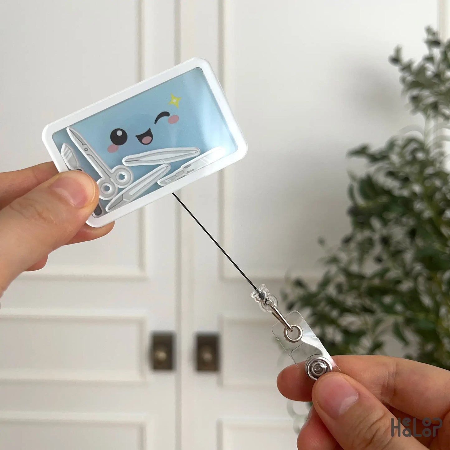 Retractable surgery tech shaker badge reel for surgical technologists and CSTs