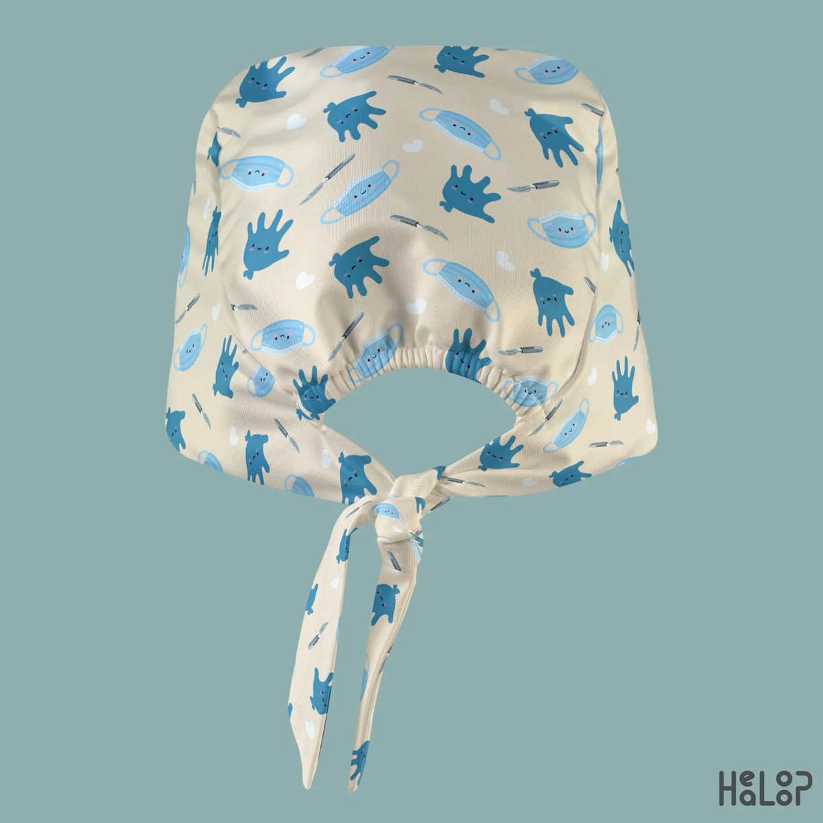 Surgical Scrub Cap shown from the back, featuring cute blue surgical gloves, masks, and scalpels on cream fabric with an elastic opening and adjustable ties.