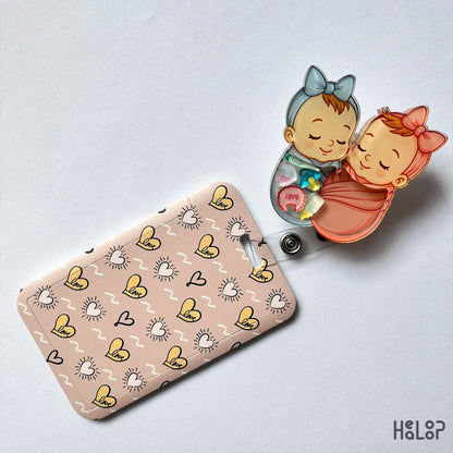 Swaddle Baby Shaker Badge Reel with matching ID card holder — perfect for NICU or hospital staff