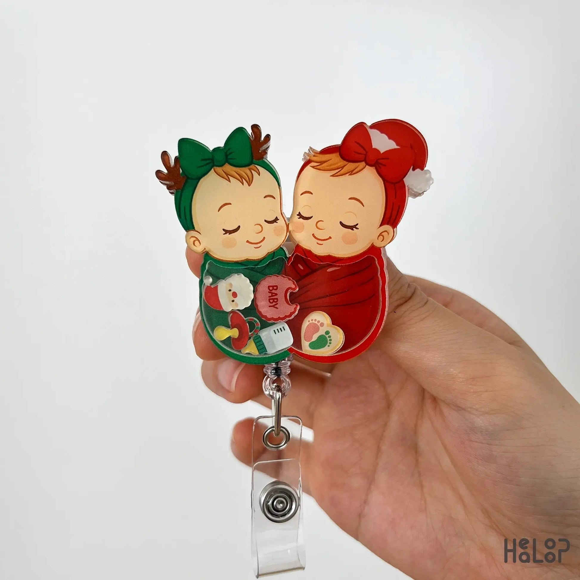Swaddle baby shaker badge reel christmas version