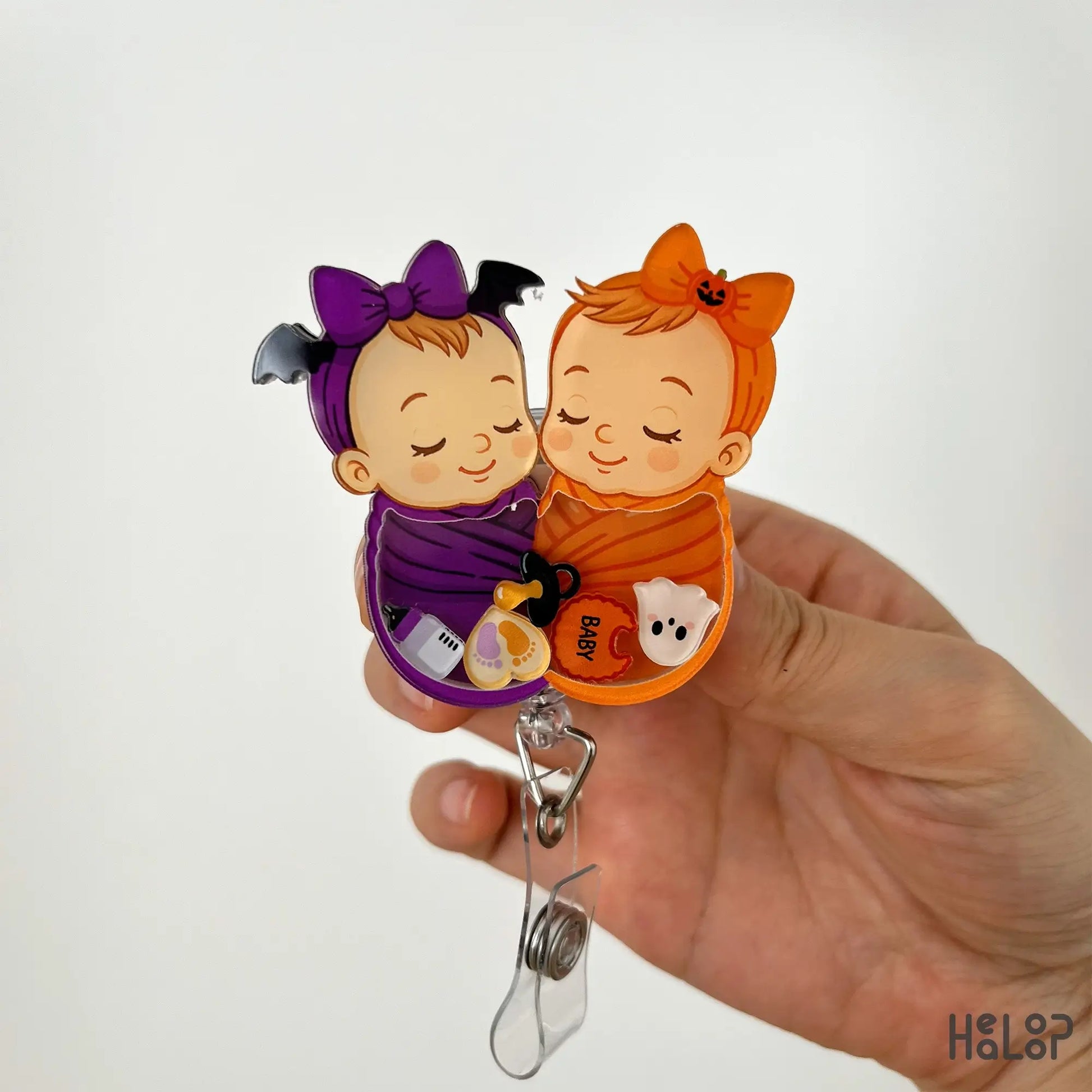 Swaddle baby shaker badge reel halloween version