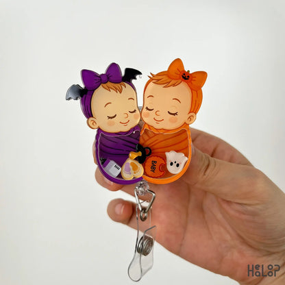 Swaddle baby shaker badge reel halloween version